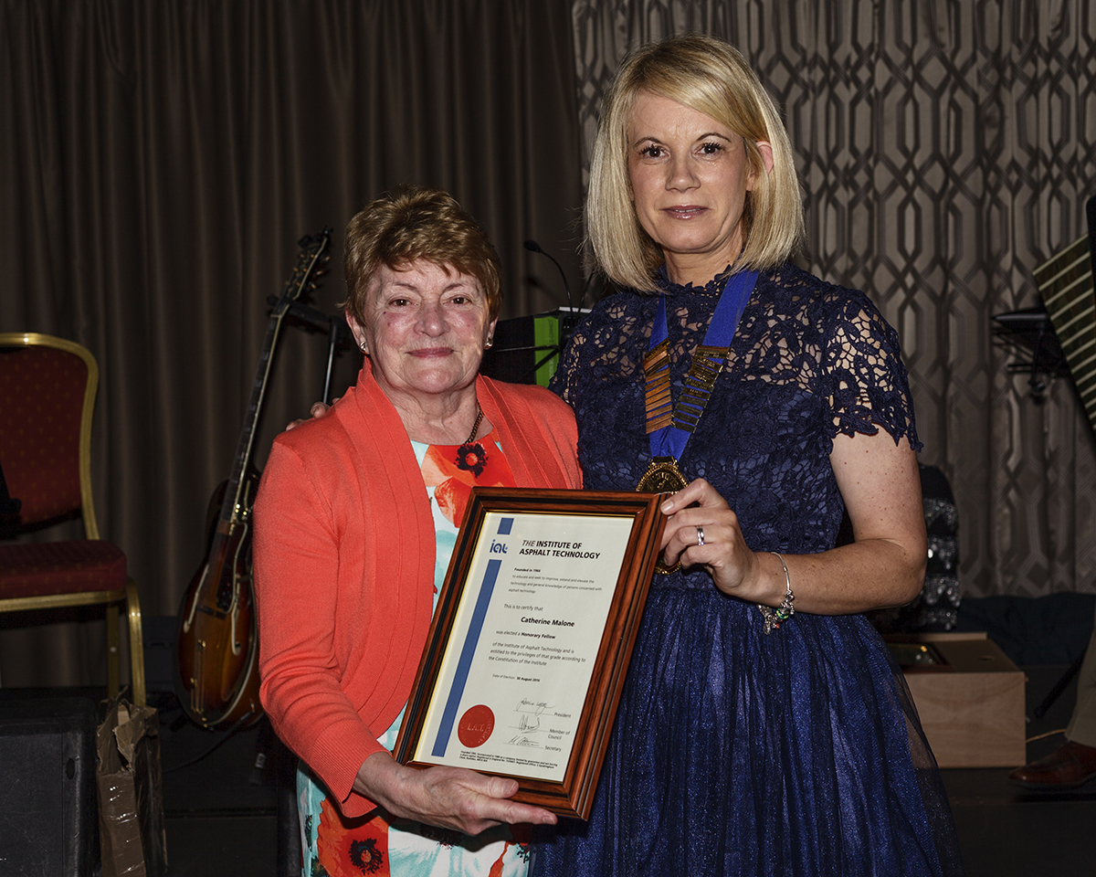 Catherine Malone receiving her Honorary Fellowship from Geraldine Walsh